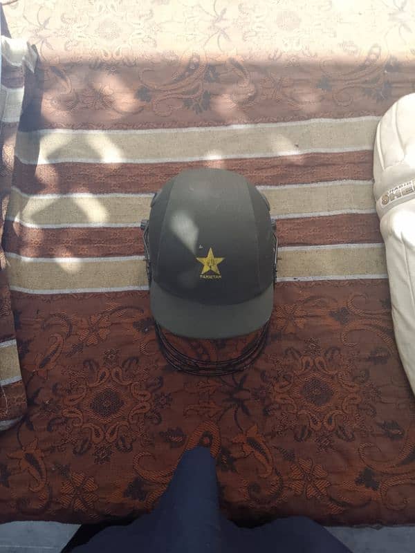 cricket helmet and pads 0