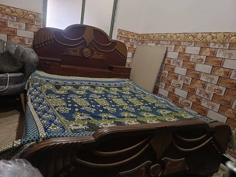 Wooden double bed with Mattress 0