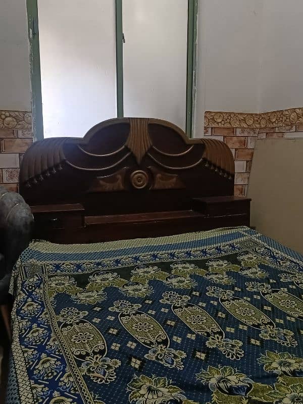 Wooden double bed with Mattress 1