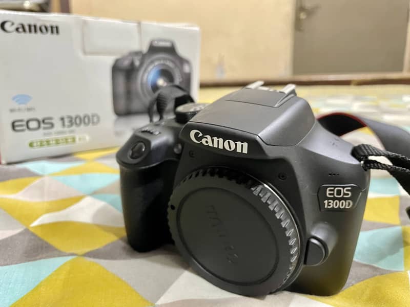 Canon 1300D DSLR with kit Lens (Almost New Condition] 0