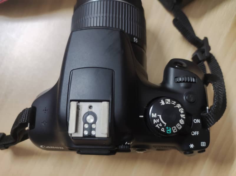 Canon 1300D DSLR with kit Lens (Almost New Condition] 9