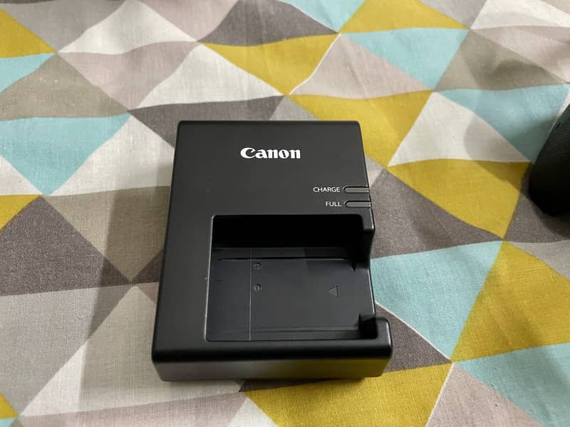 Canon 1300D DSLR with kit Lens (Almost New Condition] 10