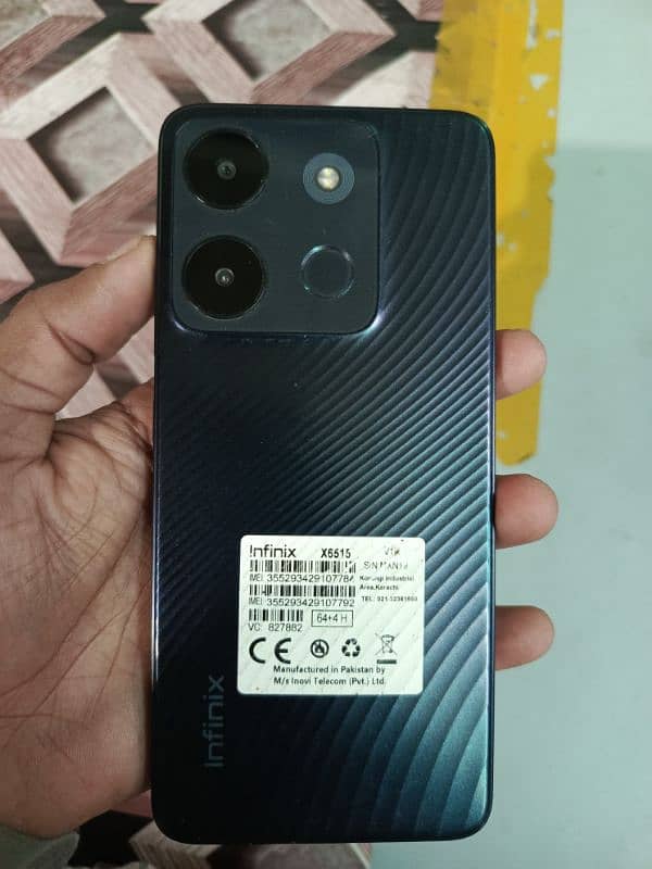 4GB 64GbB  Infinix Smart 7 Mobile Phone 1
