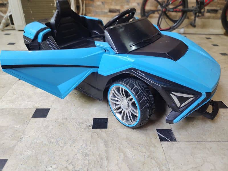 Sky Blue, single-seater toy sports car for kids. 1