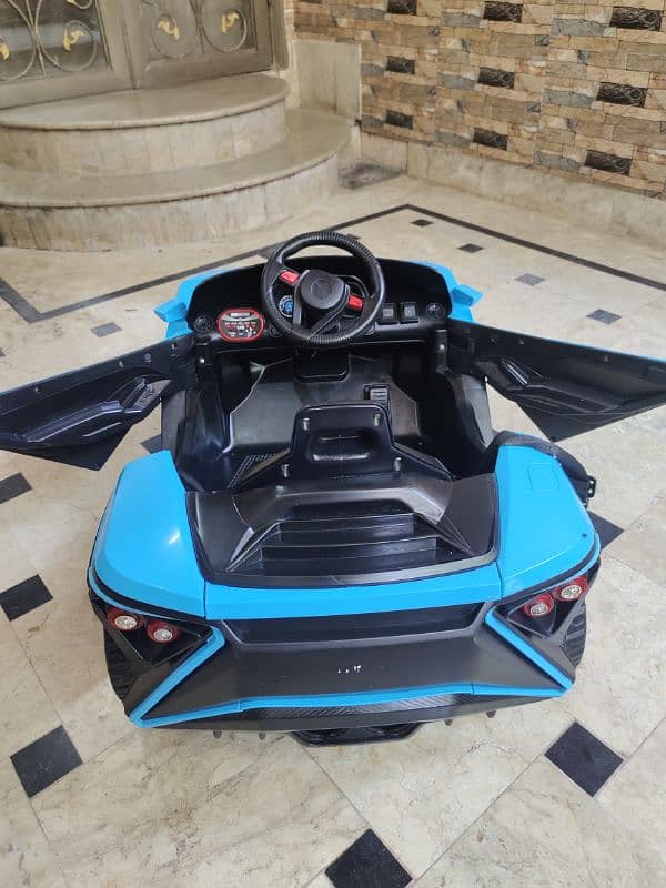 Sky Blue, single-seater toy sports car for kids. 5