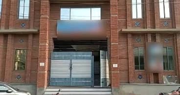 A 1 Kanal Building Located In Marghzar Officers Colony Is Available For rent 0