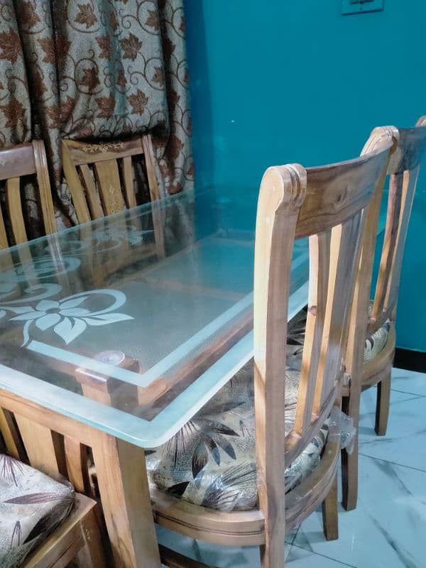 Dinning Table with 6 chairs. 1