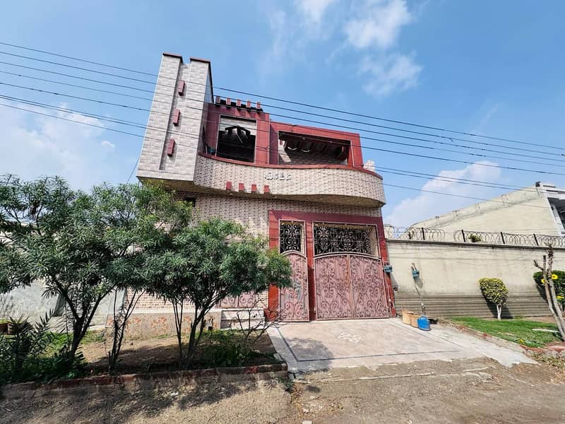 10 Marla - 3 story in posh Colony with 18kva Hybrid Solar House 1