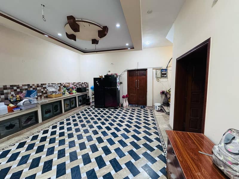 10 Marla - 3 story in posh Colony with 18kva Hybrid Solar House 15