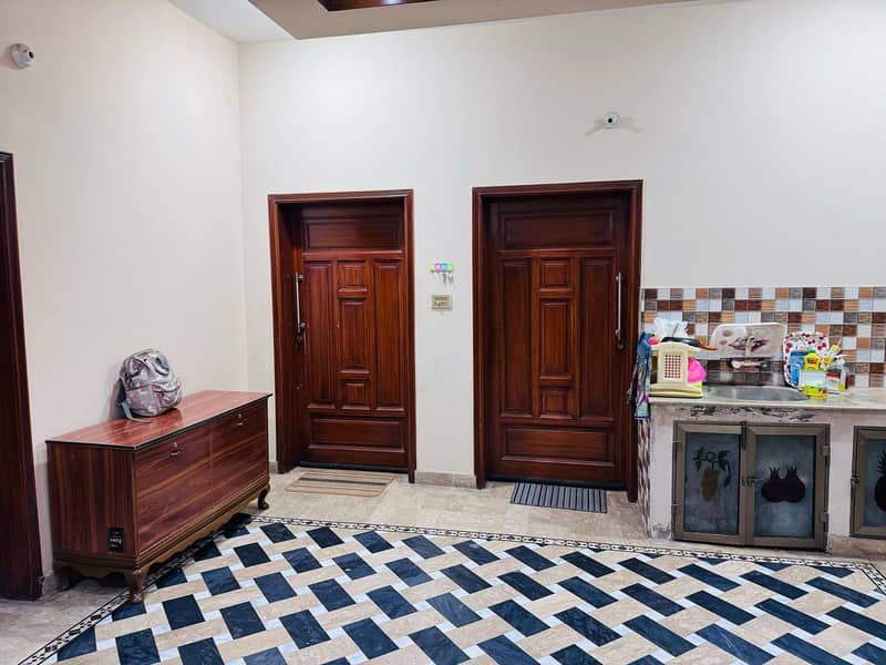 10 Marla - 3 story in posh Colony with 18kva Hybrid Solar House 16