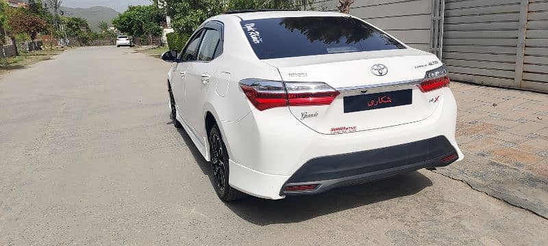 Toyota Corolla Altis Grande black interior 2024 3