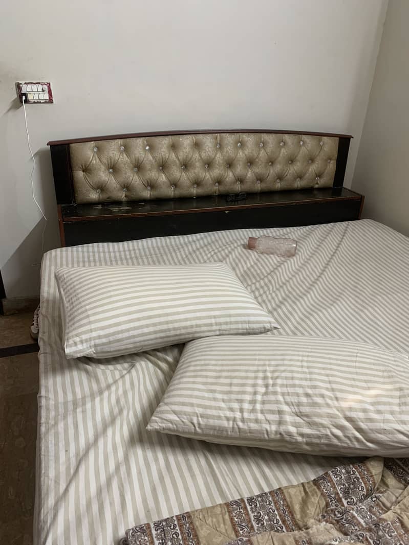 Semi quilted bed and a spring mattress 1