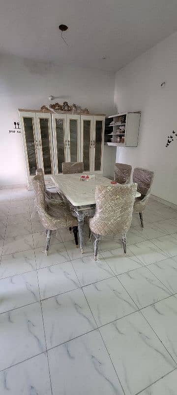 DINNING TABLE WITH CHAIRS AND 3 WORDDROBES 1