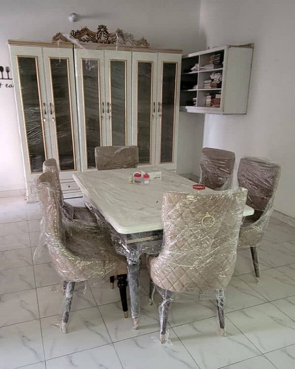 DINNING TABLE WITH CHAIRS AND 3 WORDDROBES 2