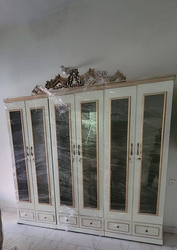 DINNING TABLE WITH CHAIRS AND 3 WORDDROBES 3