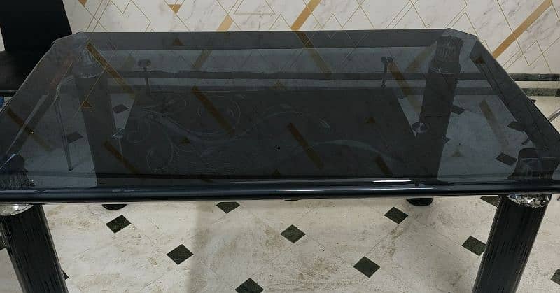 six siter dining table in black theme 0