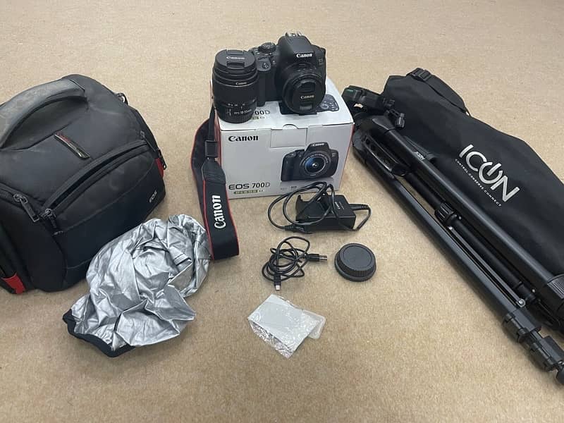 canon camera 700d dslr 50mm lens 18-55mm lens tripod stand camera bag 0
