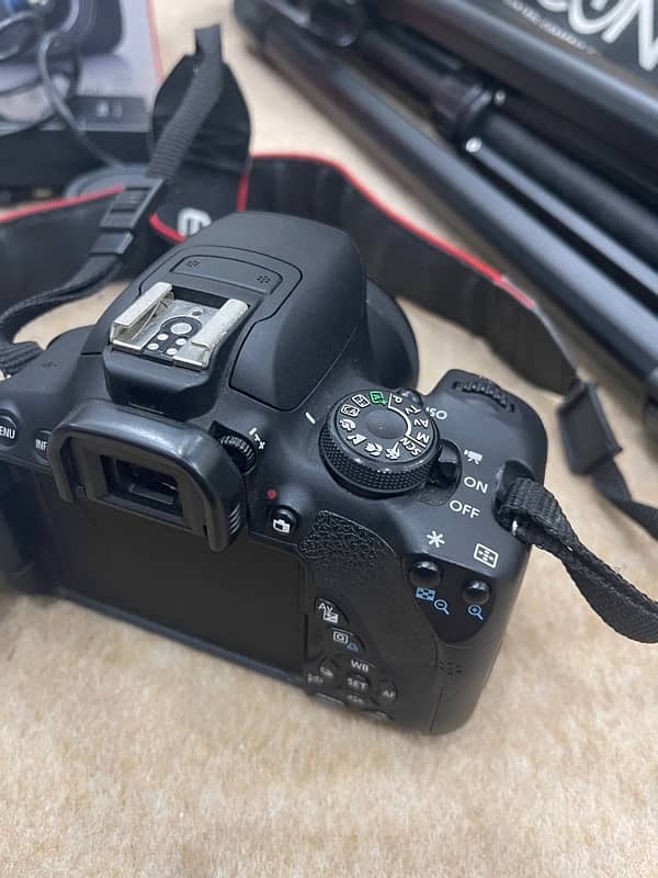 canon camera 700d dslr 50mm lens 18-55mm lens tripod stand camera bag 4