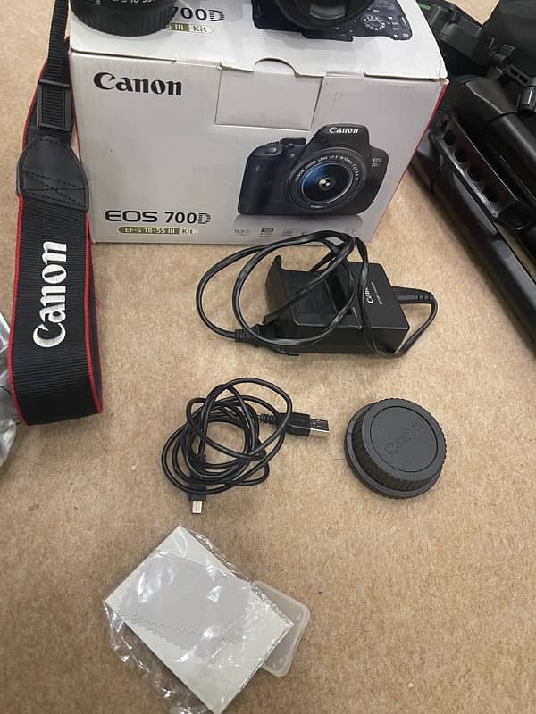 canon camera 700d dslr 50mm lens 18-55mm lens tripod stand camera bag 7