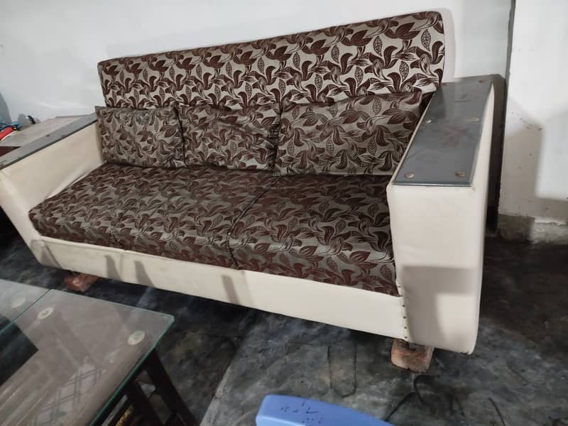 complete sofa set with covers . . 2