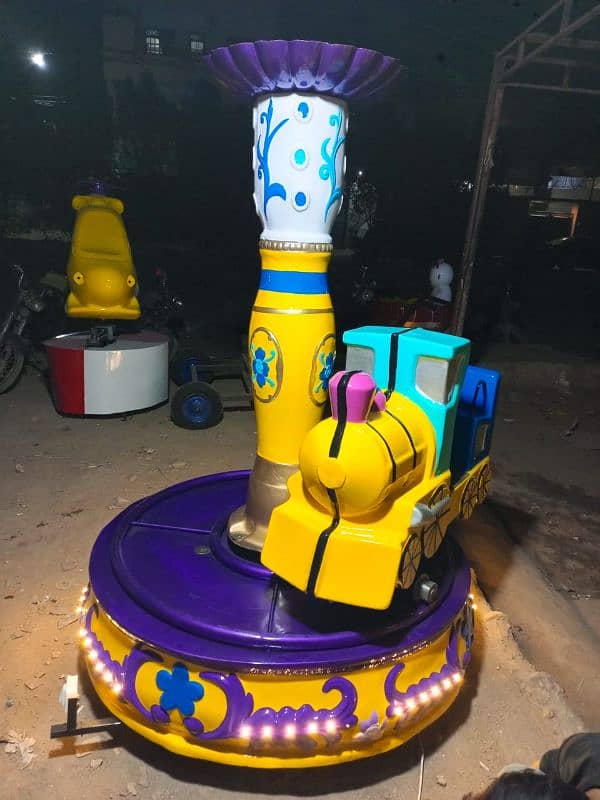 Swing Rides |  Toyland | Kid Ride | Token / Rides / jumping caslte 15