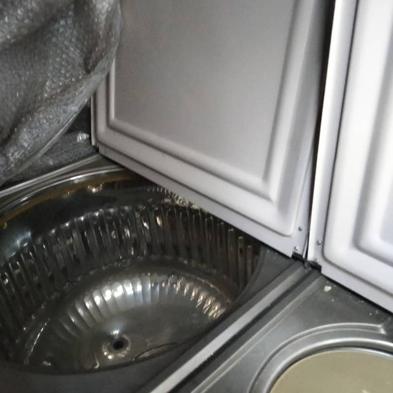 Brand new washing machine with dryer is sale due to family shifted 1