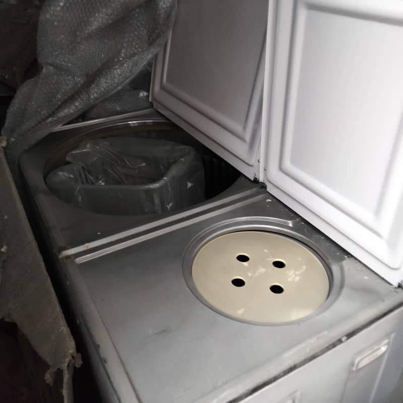 Brand new washing machine with dryer is sale due to family shifted 2