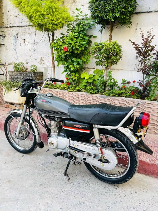 HONDA CG 125 - ISLAMABAD REG GOLDEN NUM - MODEL 2021 - ORIGINAL SAMAAN 18