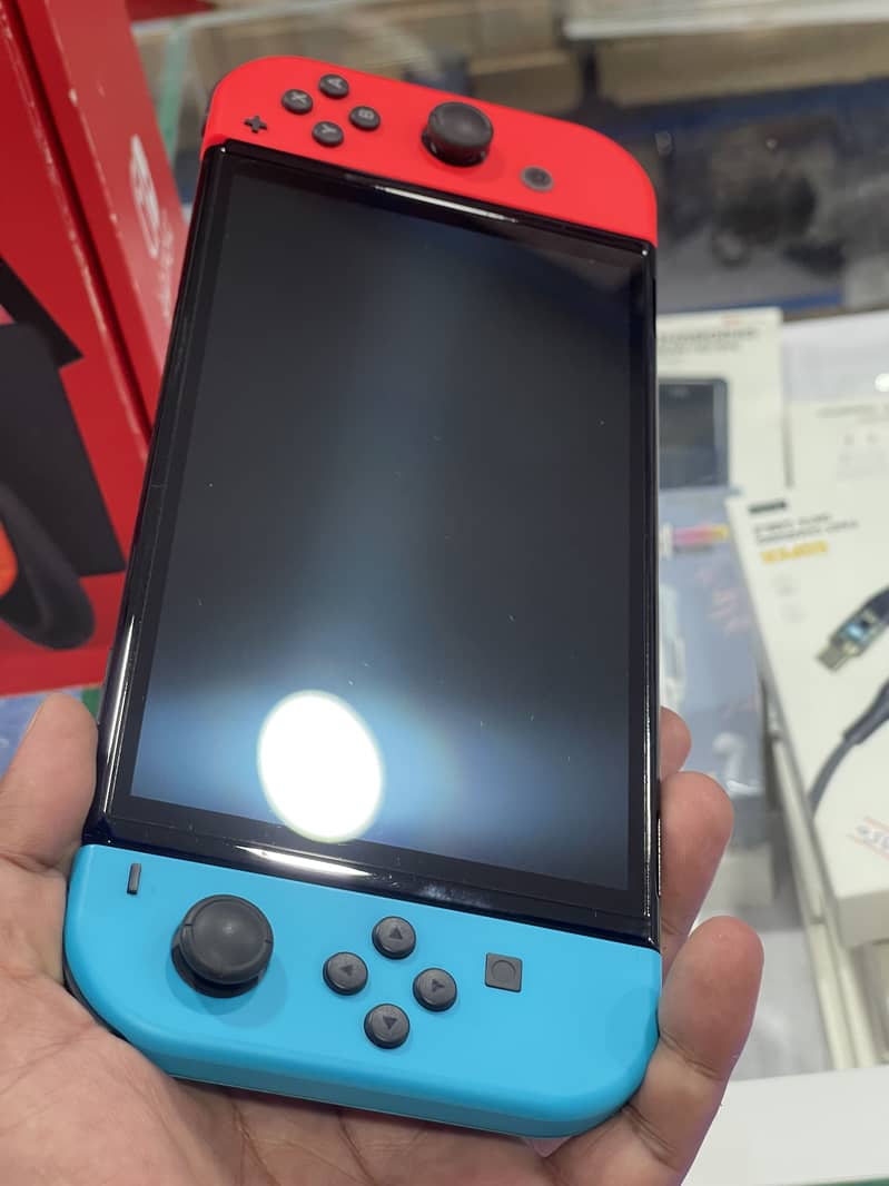 Nintendo Switch OLED Slightly USED 6