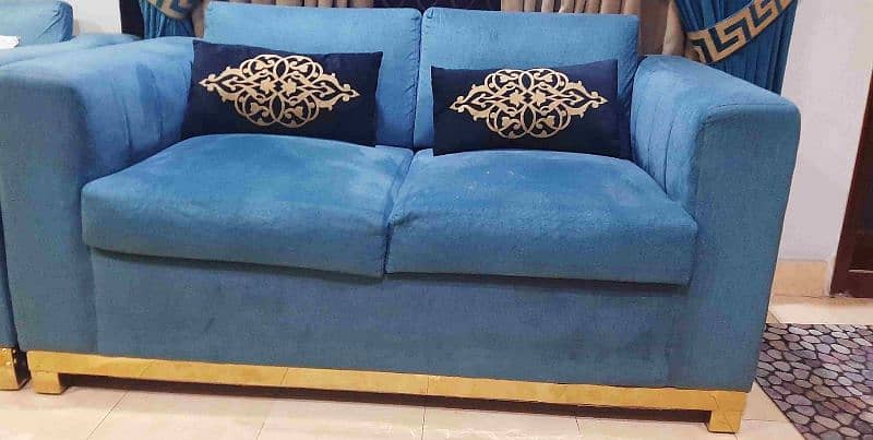 9 seater L shaped turquoise sofa set without cushions 1
