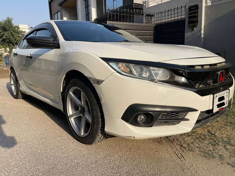 Honda civic 1.8 vti oriel prosmetic 1