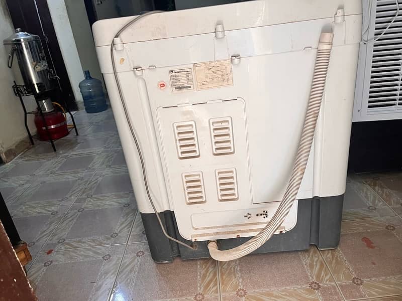 Dawlance top load Washing machine and dryer DW 6550 0