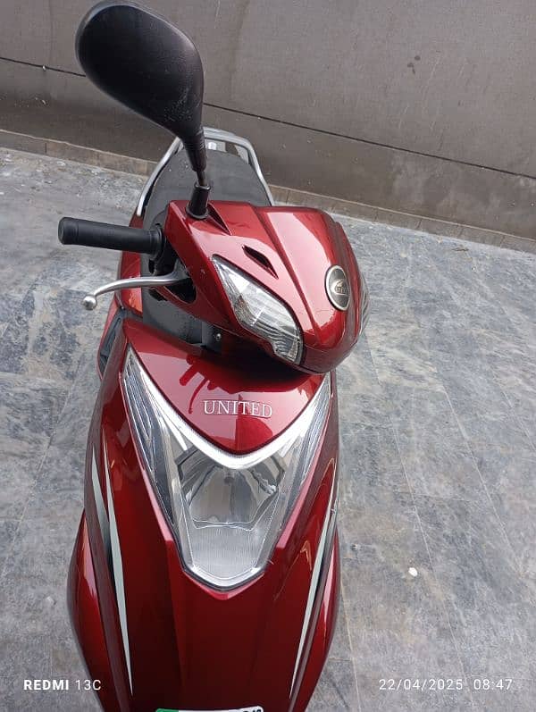 united scooty 100cc 1