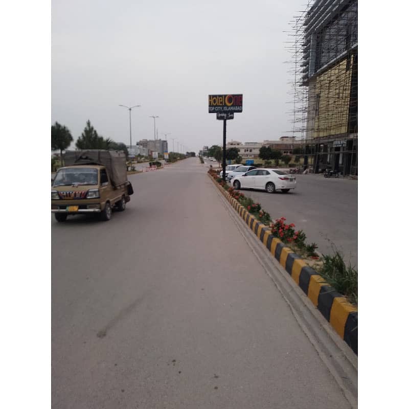 10 Marla Corner Residential Plot Available. For Sale in Top City 1 Block D Islamabad. Hafeez Jalandari Road. 35