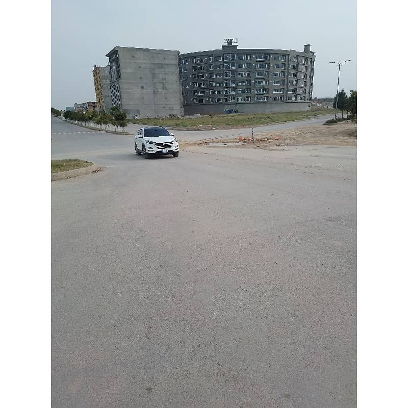 10 Marla Corner Residential Plot Available. For Sale in Top City 1 Block D Islamabad. Hafeez Jalandari Road. 45