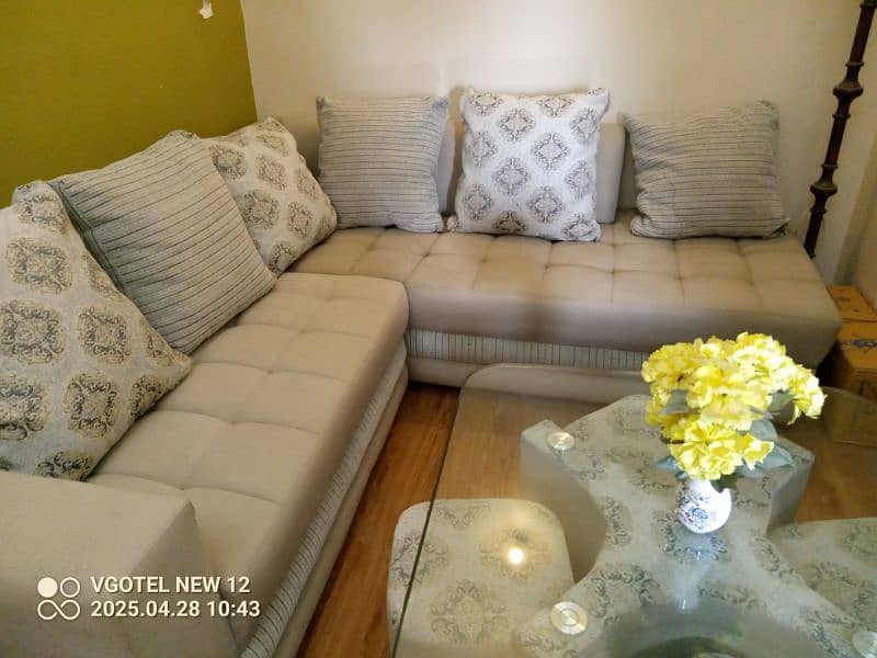 L shaped sofa + 4 stool with glass table 0