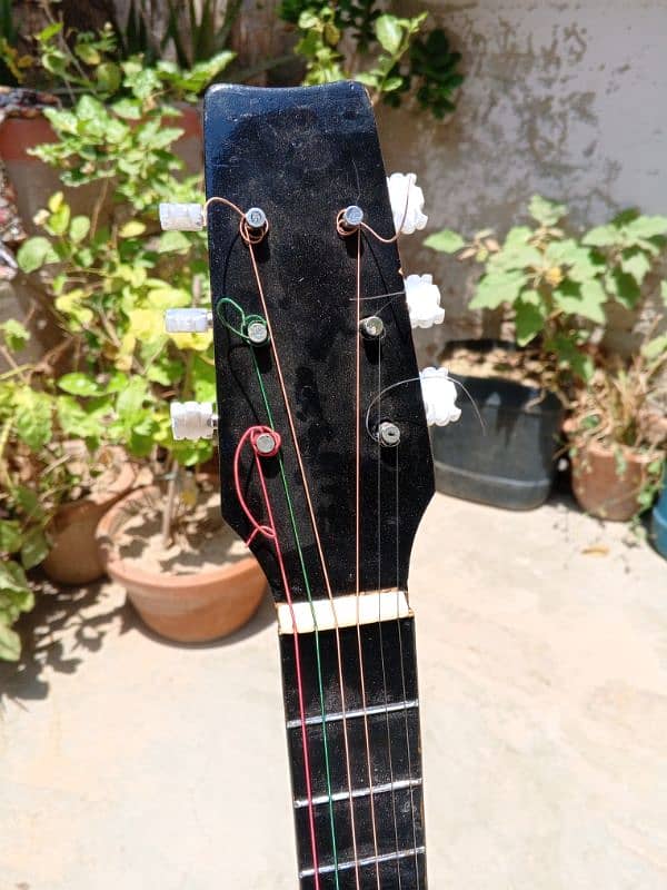 38* inches used guitar looking almost new. 1