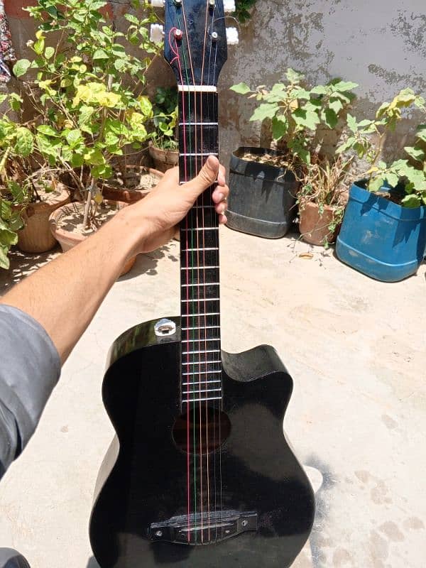 38* inches used guitar looking almost new. 5
