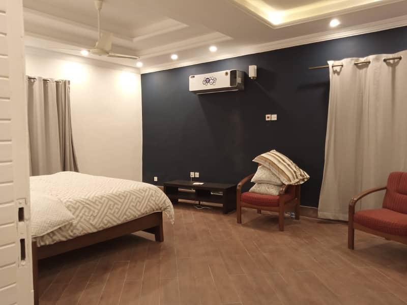 Beautiful Independent Ground Portion For Pakistani Or Foreigners Fully Furnished ,Also Lawn 12