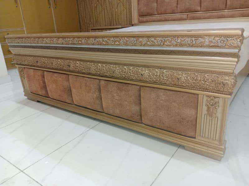 A Beautiful Bed and dressing in goldish colour 1