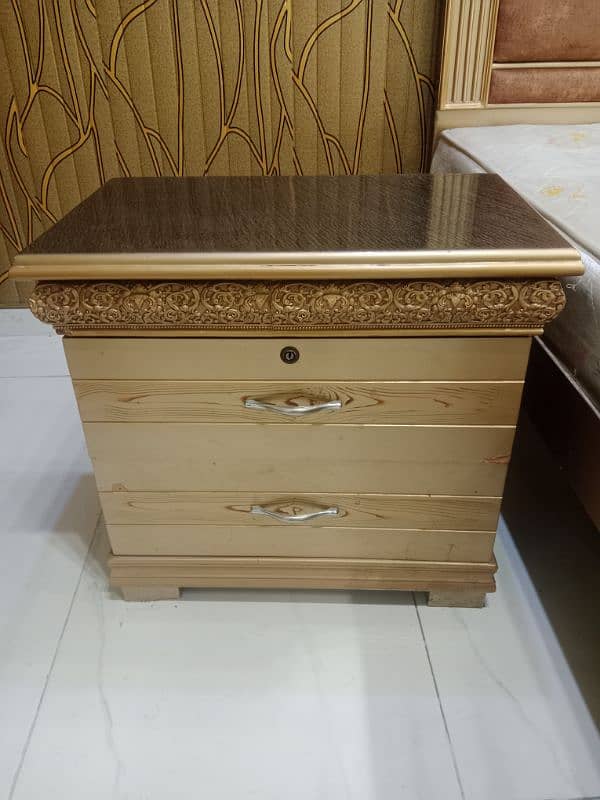 A Beautiful Bed and dressing in goldish colour 3