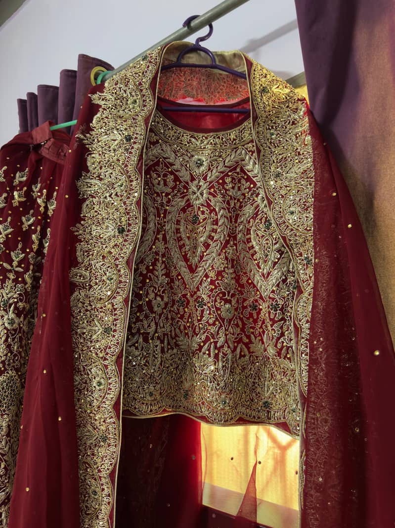 Bridal Mehroon Lehnga . Heavy Handwork - zari ,Gota , seQuins- pearls 6