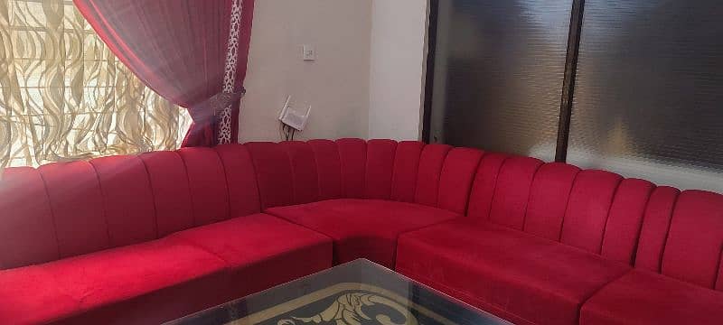 red colour sofa slightly  used 3