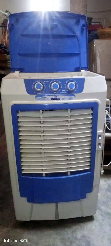 indus air cooler only one month use with box and viranty card 0