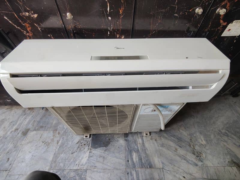 midea 1.5 ton non inverter original condition 0