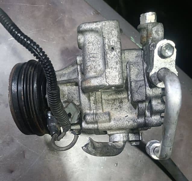 Mira 2017 Model A. C genuine Compressor. 1