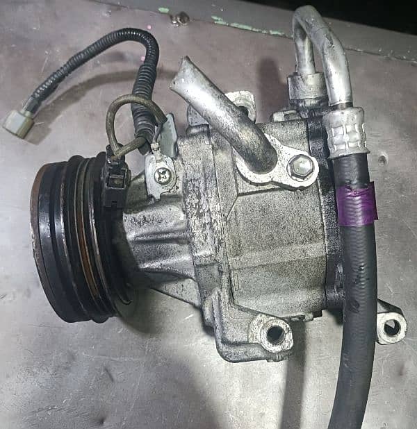 Mira 2017 Model A. C genuine Compressor. 3