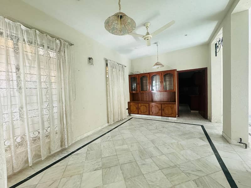 One Kanal Slightly Used Ultra-Modern Designer Facing Park Bungalow For Sale At Prime Location Of DHA 4