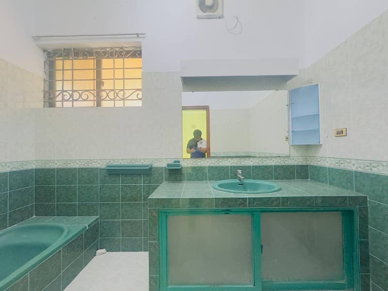 One Kanal Slightly Used Ultra-Modern Designer Facing Park Bungalow For Sale At Prime Location Of DHA 9