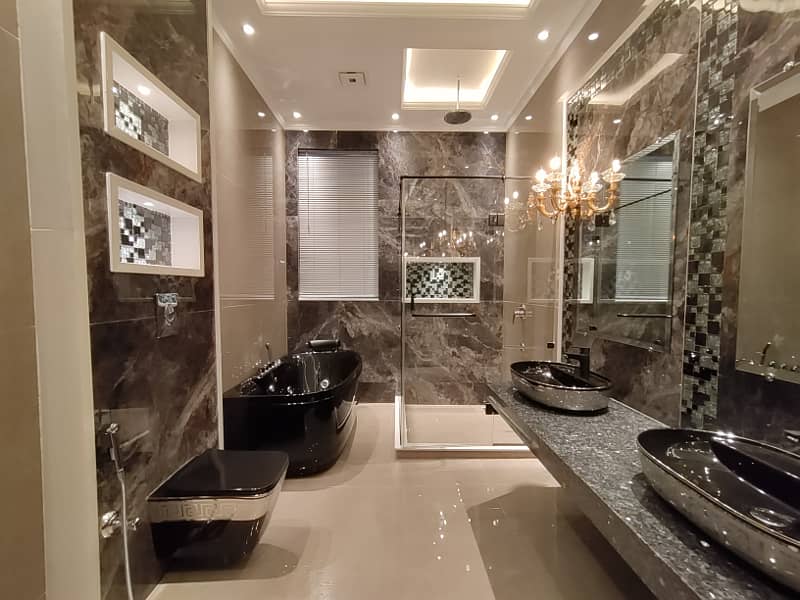 One Kanal Brand New Spanish Design Most Beautiful Owner Build Bungalow 2 Servant Quarter In Basement For Sale At Prime Location Of DHA Lahore Near To Park Masjid & Commercial Market. 16